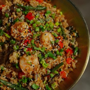 Delicious shrimp fried rice packed with colorful vegetables and seasoned to perfection.